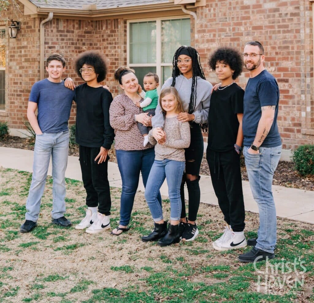 Photograph of a family at Christ's Haven