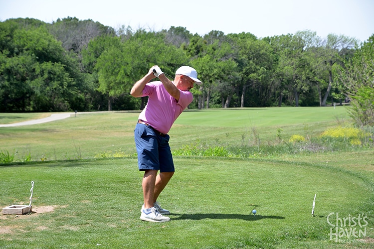 Golfer taking a swing